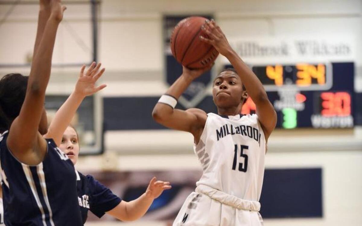 Millbrook's Zairya West (15) shoots a basket against Heritage in Raleigh, N.C. on Friday, February 5, 2016. Millbrook won 59-53.