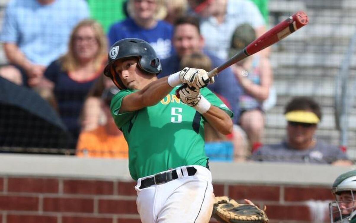 Cardinal Gibbons’ Daniel Haberem (5) watches his hit go to the fence in the 6th inning for the stand up double. The Crusaders of Cardinal Gibbons High School defeated the Trojans of South Johnston High School 8-0 to advance to the 3rd round of the playoffs in Raleigh, N.C. on Saturday, May 16, 2015.