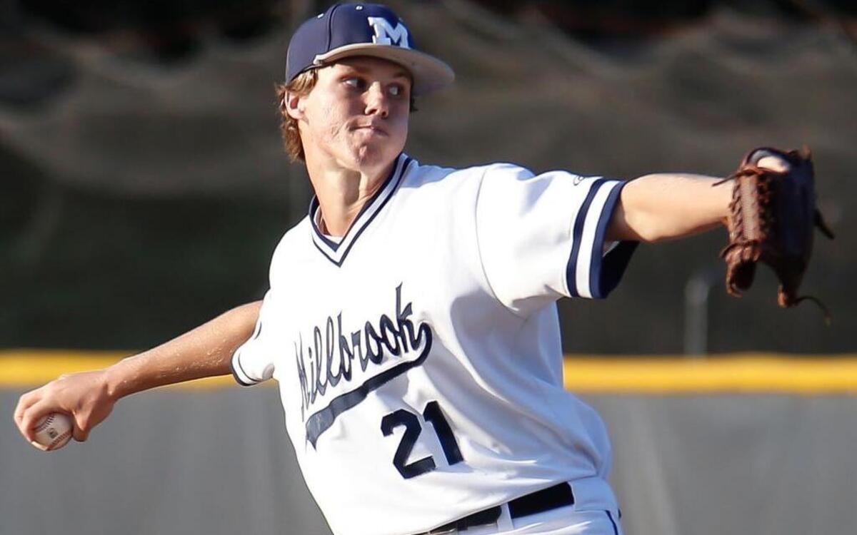 
Millbrook's Alex Royalty (21) pitches during Fuquay-Varina's NCHSAA 4A east regional game at Millbrook on Thursday, May 28, 2015.
