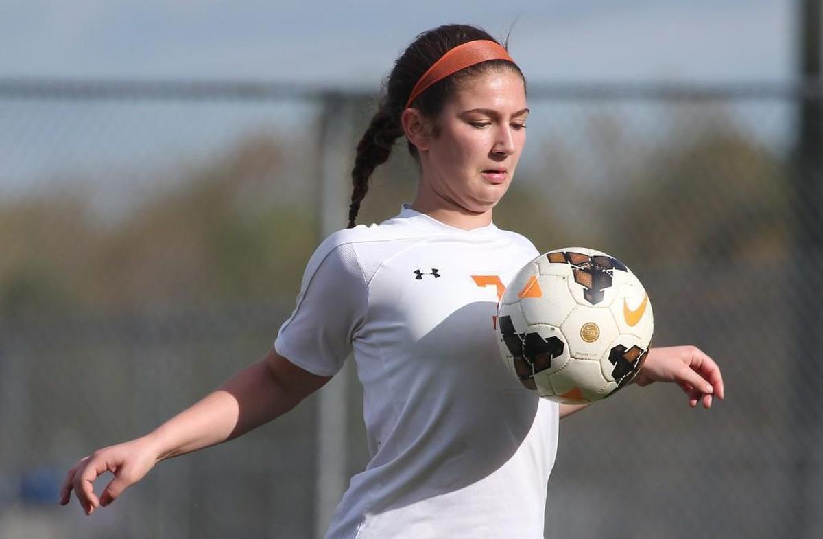 Orange's Natalie Chandler ( 7) stops the ball during the Northwood Chargers high school soccer game with the Orange Panthers high school on April 5, 2017.