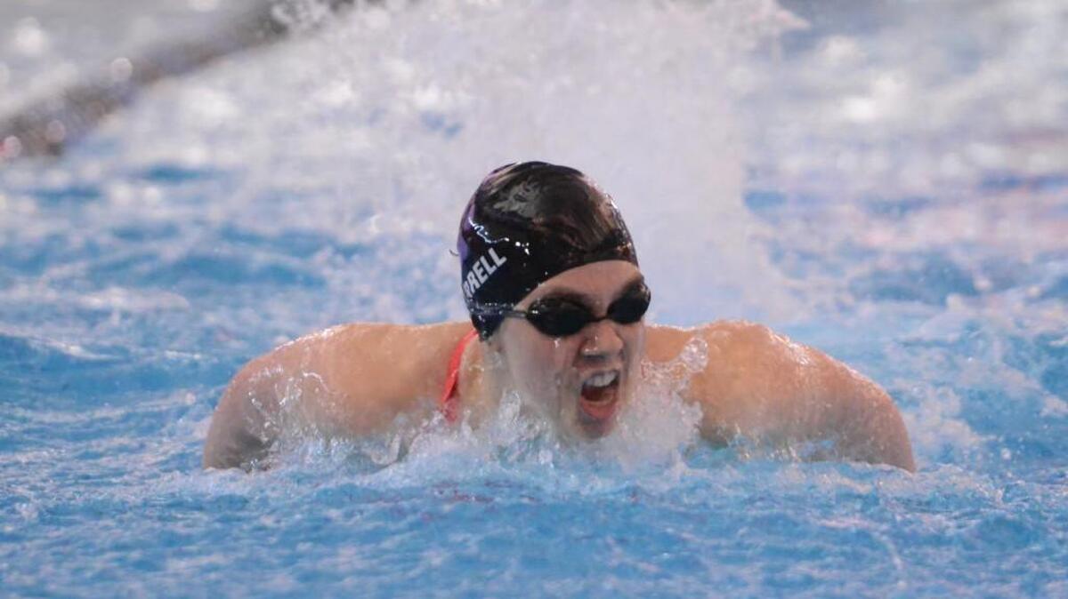 Mia Morrell of Carrboro swims in the 3rd leg of Women's 200 Yard Medley Relay race during the 1A/2A NCHSAA State Swimming Championships that took place at the Triangle Aquatic Center in Cary, N.C. on Saturday, February 13, 2016.