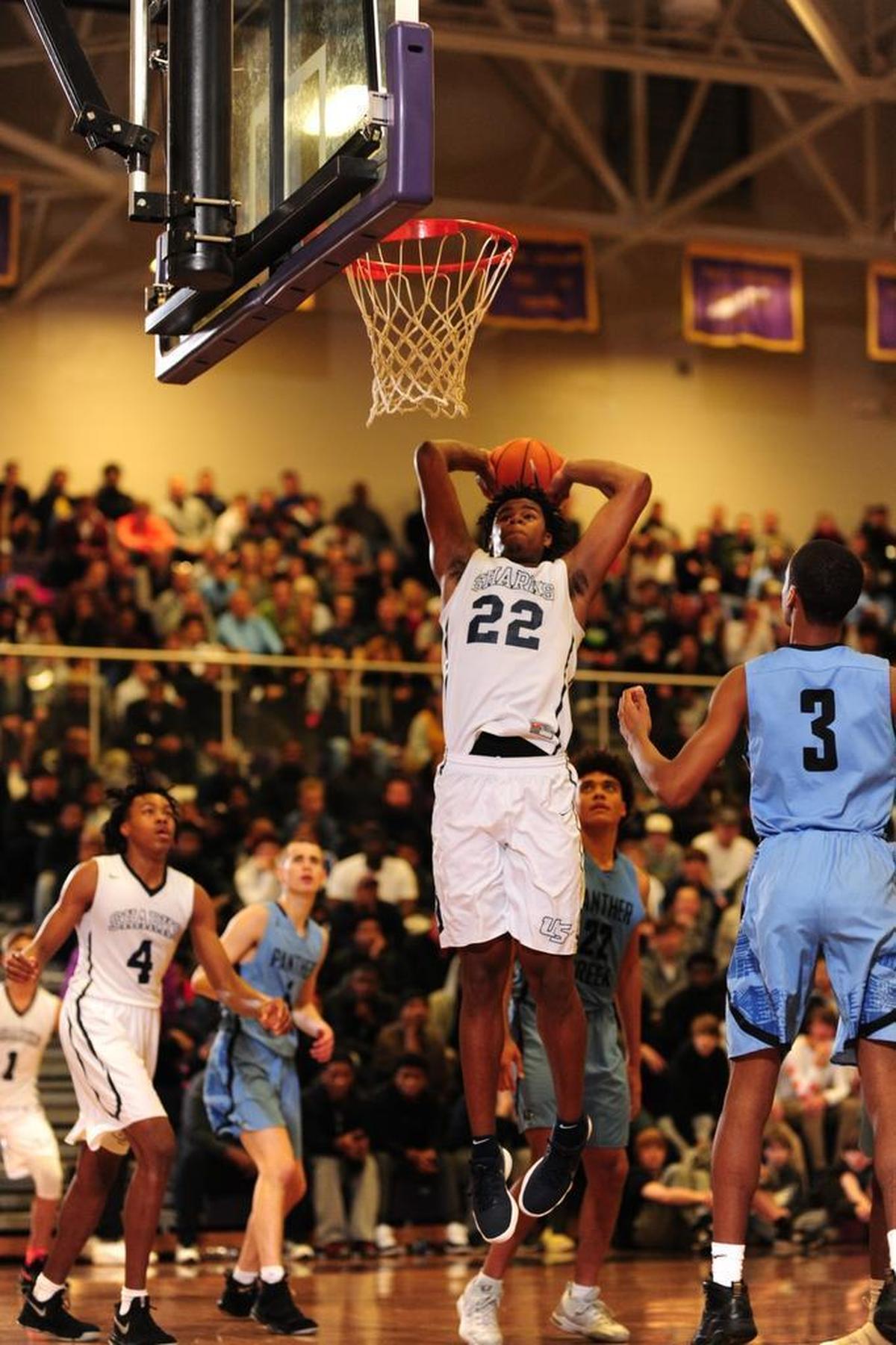 University School forward Vernon Carey, Jr. slams home two points during the opening round of the John Wall Holiday Invitational at Broughton High School.