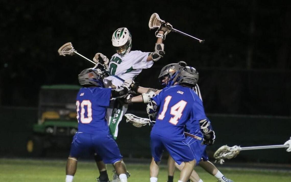 At 6-8, Philip Blackley of Cary boys lacrosse poses matchup problem