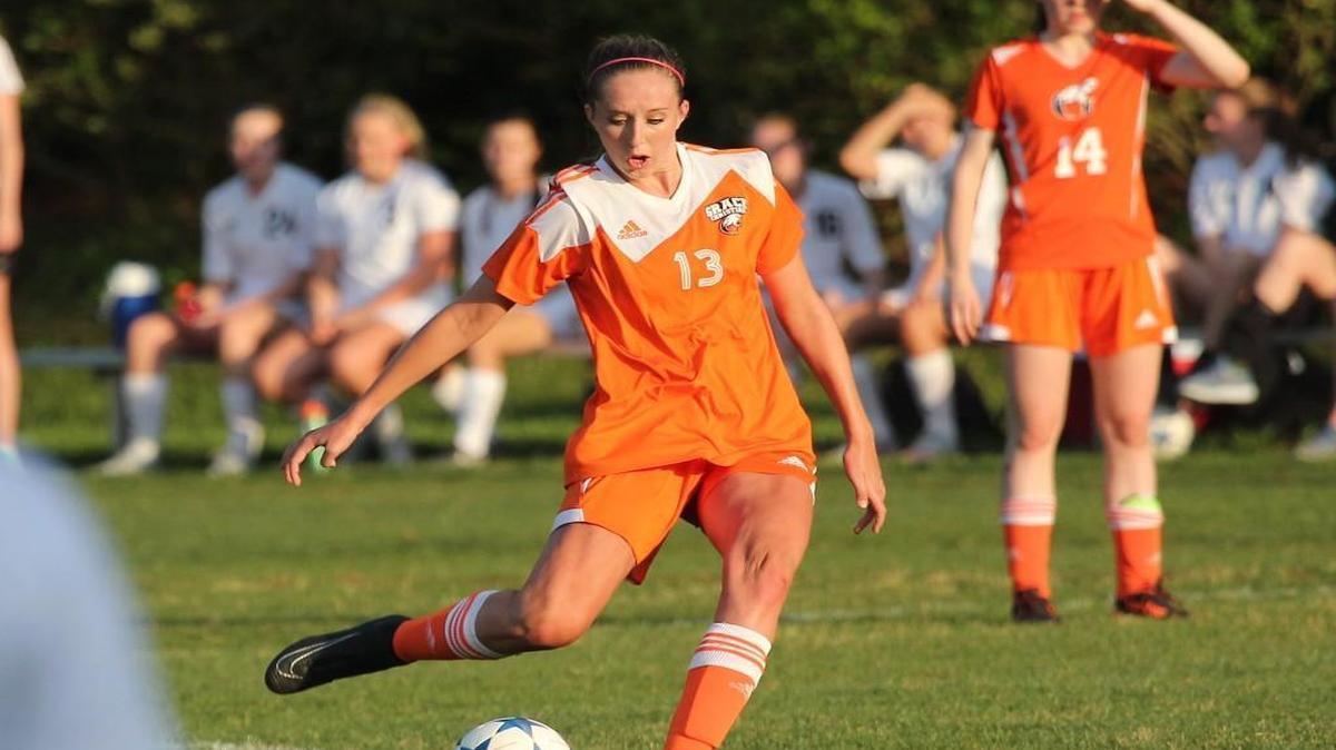 Grace Christian's Alexis Lang (13) kicks a penalty kick during the Grace Christian Raleigh high school soccer game with the Cary Christian high school on April 20, 2017. Grace Christian Raleigh won the game 2-0.
