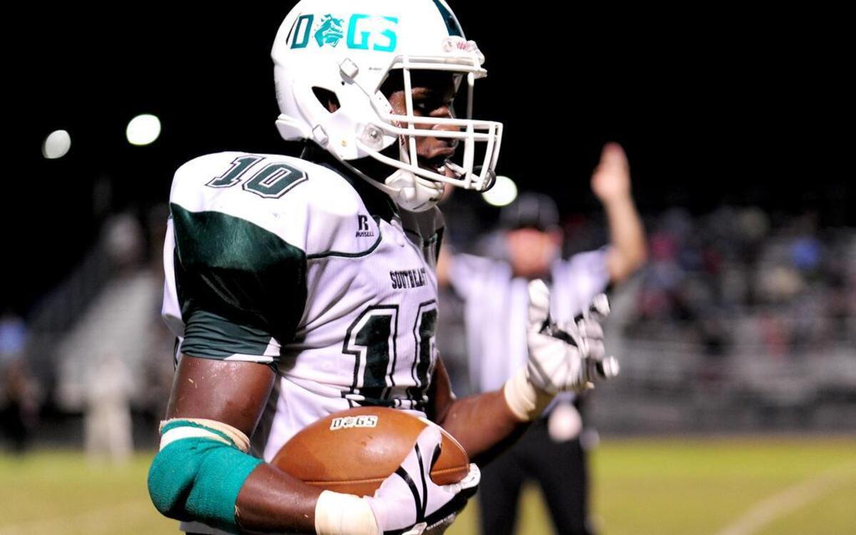 Southeast Raleigh's Tyler Williams scores a touchdown. The Southeast Raleigh Bulldogs visited the Millbrook Wildcats in a high school football game on Sept. 22, 2017.