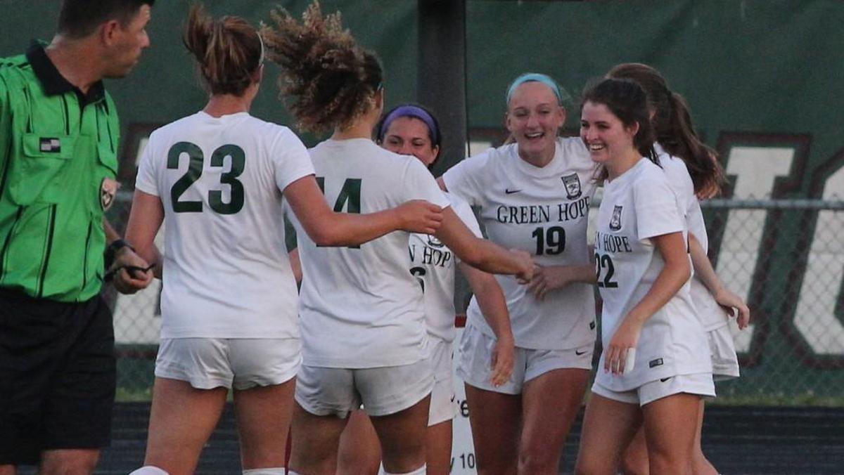 Green Hope's Grace Wagner (19) is all smiles after her score during the Leesville Road high school soccer match with Green Hope high school in the third round of the state high school playoffs at Cary N.C. on May 16, 2017. Green Hope won 5-0.