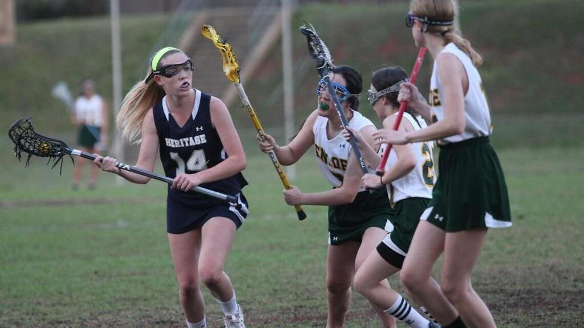 Heritage holds off Enloe girls lacrosse