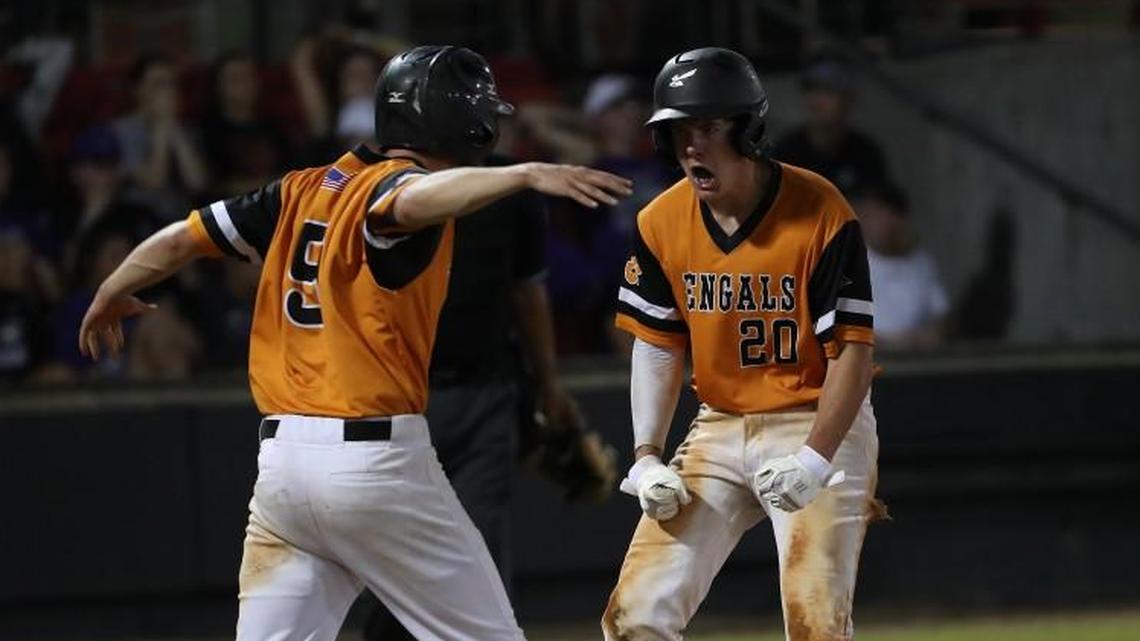 Fuquay-Varnia's Jack Howell (20) MVP for Fuquay . Celebrates with Vinny Consolo (5) after he scored. The Ardrey Kell Knights visited the Fuquay-Varina Bengals iin game three of the NCHSAA Championship game on June 2, 2018 at Mudcats Stadium. Zebulon, N.C.