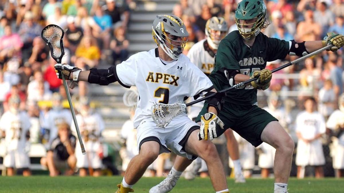 Apex's Jack Hayden (3), left, during the boys lacrosse game, which was played in Apex on Tuesday, May 10, 2016. Cardinal Gibbons won 8-6.
