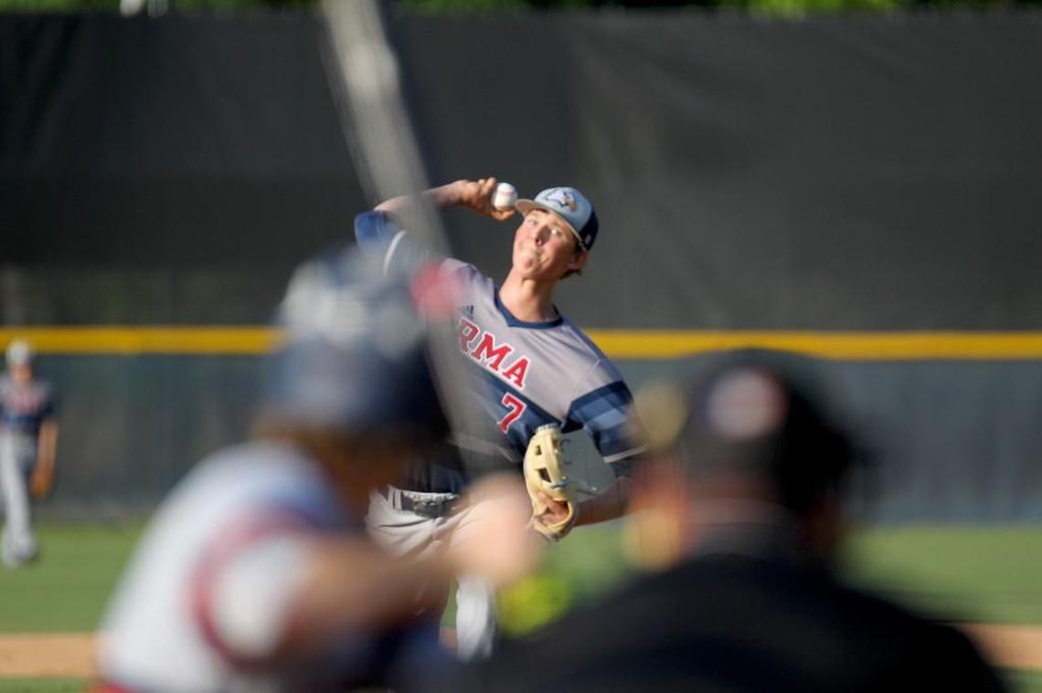 Rocky Mount Academy's Reid Johnston (7) delivering the pitch during the Rocky Mount Academy boy's baseball game against at Faith Christian in Rocky Mount, N.C. on Friday, April 28, 2017.
