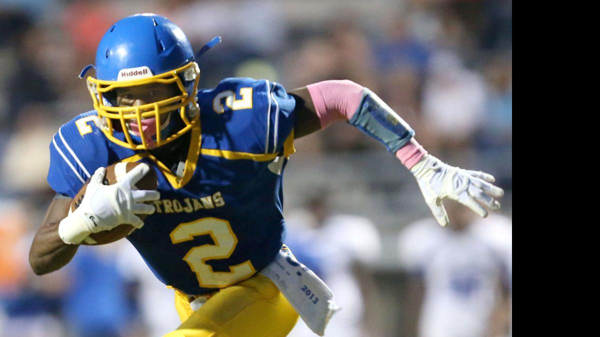 
Garner's Nyheim Hines runs during their game against Clayton High School October 10, 2014 in Garner.
