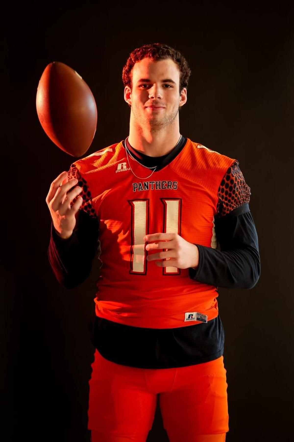 Orange's Payton Wilson, a member of the N&O All-Metro Football Team, poses for a portait on Thursday, December 21, 2017.