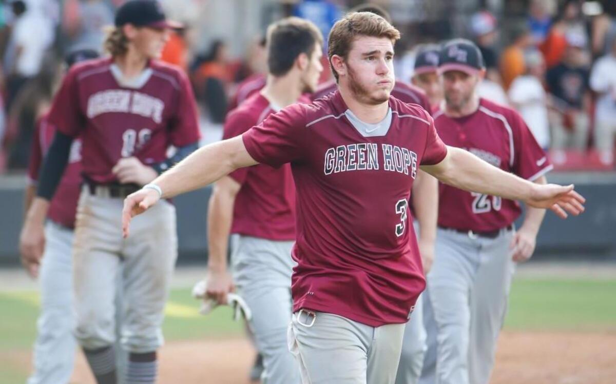 Green Hope's frustrated Trevor Losito (3) walks back to the dugout following the NCHSAA 4A State Championship baseball game between Green Hope and North Davidson in Zebulon on Friday, June 3, 2016. North Davidson won the game 6-0, the first in a best-of-three series.