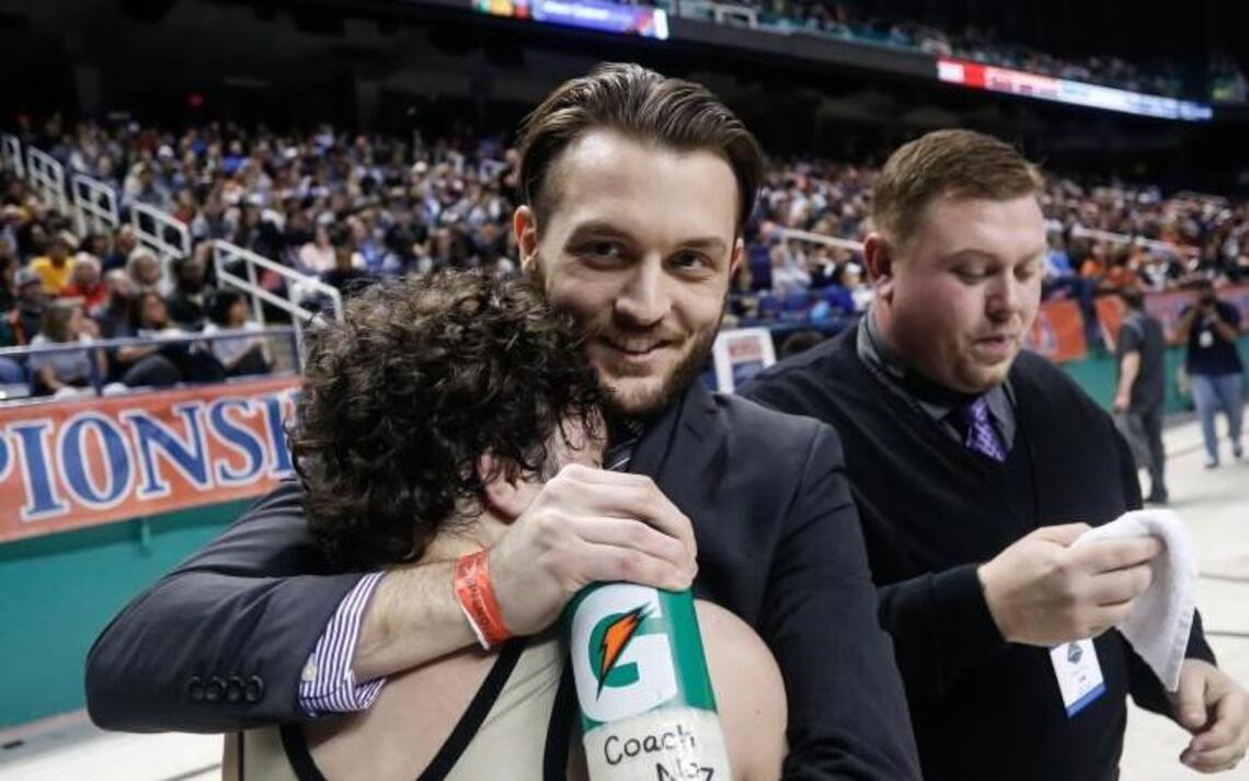 Holly Springs wrestling coach Nick Nosbisch wins NCHSAA courage award