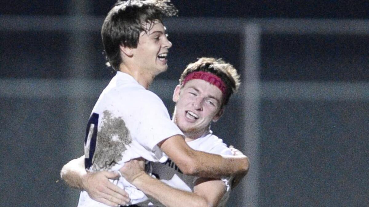 Cleveland’s Hunter Lee, left and teammate Lawson Lamm celebrate Hunter’ Lee’s penalty kick goal, which helped the Rams take a 3-1 victory in the 3A playoffs on Wednesday night.