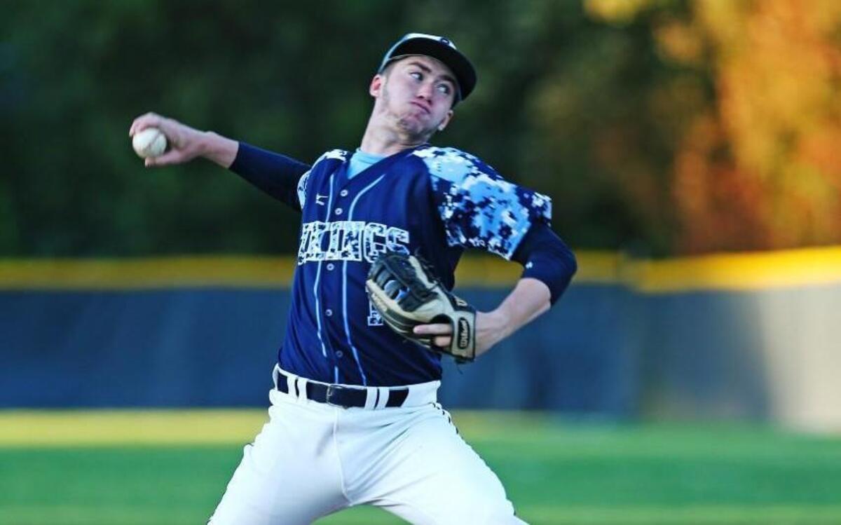 South Granville's Justin Bullock (12) delivers a pitch in in the first inning and goes on to get 18 strikeouts in his victory over Northwood on April 2. South Granville defeated Northwood 3-0 to win the championship.