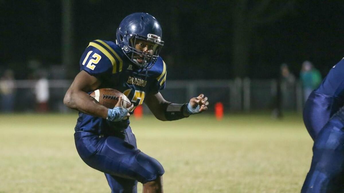 Goldsboro's Xzavior Bowden (12) heads for the end zone for his fourth touchdown early in the 3rd quarter. He tallied over 300 yard and 5 touchdowns for the game. The Spring Creek Gators visited the Goldsboro Cougars in a high school football game on Friday, October 27, 2017.