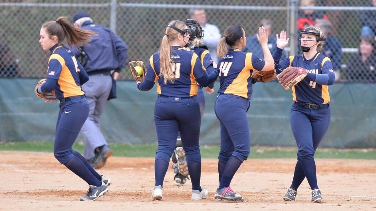 Northern celebrates a win. The Northern Durham Knights played the Jordan Falcons in a softball game that took place in Durham, N.C. on Friday, March 17 2017. Northern Durham won 21-0.