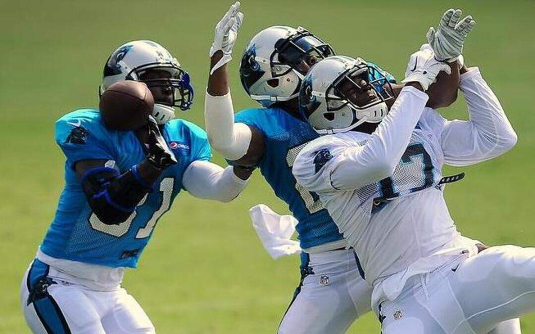 
The addition of players such as cornerback Charles Tillman, left, and the emergence of cornerback Josh Norman, center, has moved the Carolina Panthers’ secondary from no-name to in need of a nickname.
