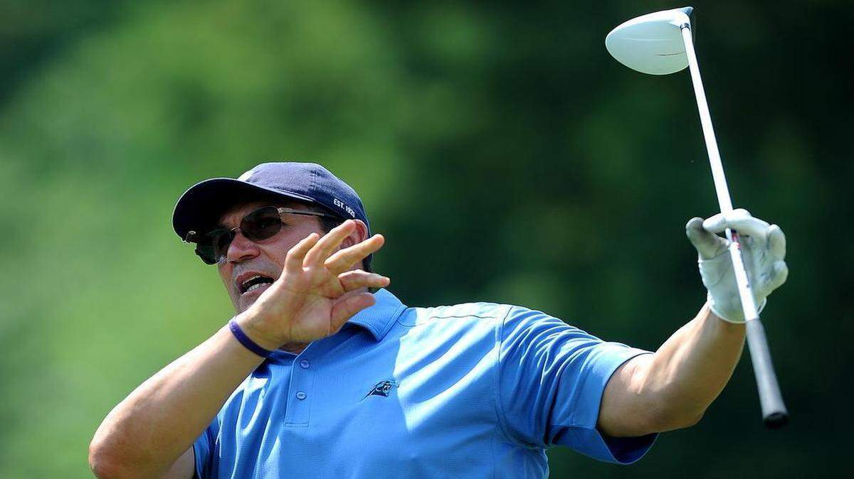 
Carolina Panthers head coach Ron Rivera watches his drive from the second tee box during the HoopTee Celebrity Golf Tournament at Ballantyne Resort on Thursday. Rivera and the Panthers report to training camp in Spartanburg, S.C., next week. 
