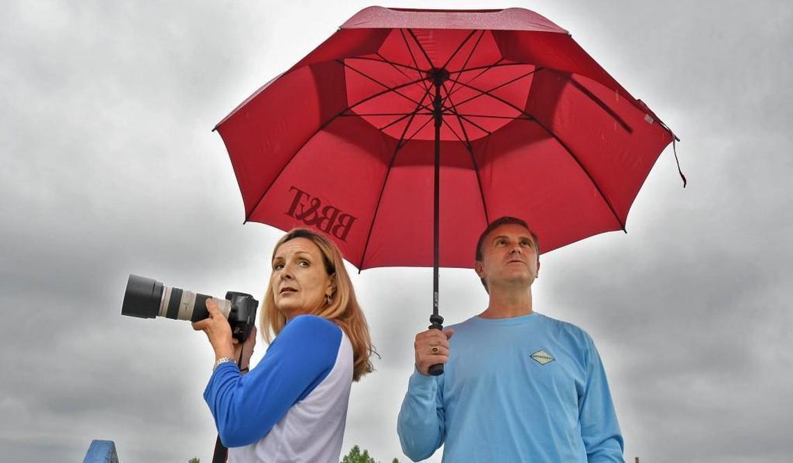 Selena and Evan Gore alternate watching their son MacKenzie Gore play on the baseball field and daughter Lexie play soccer behind them from the stands of the football Stadium in Whiteville, N.C., Saturday, May 13, 2017.