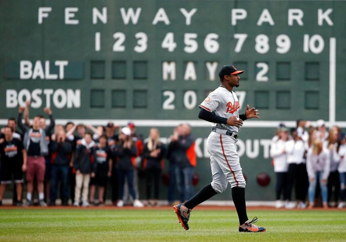 The Baltimore Orioles' Adam Jones warms up before a game against the Boston Red Sox on May 2, 2017 in Boston. Jones called an incident in which he said fans inside Fenway Park yelled racial slurs at him and threw a bag of peanuts in his direction was "unfortunate," with no place in today's game. (AP Photo/Michael Dwyer)