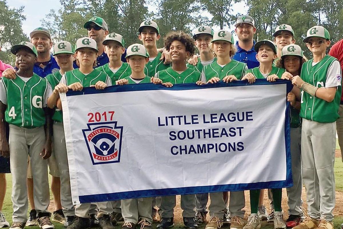 The Greenville North State All Stars pose for a photo after winning the Little League Baseball Southeast Regional Wednesday, Aug. 9, 2017. Pictured are (front row, from left) Cash Daniels-Moye, Joesph Bryne, Jacob Caulder, Bryce Jackson, Cameron Greenway, Drew Fields, Ashton Byars and Chase Anderson; and (back row, from left) coach Mike Vaughn, Luke Lambert, manager Brian Fields, Will Casey, Matthew Matthijs, Carson Hardee, coach Jake Allen and Thomas Barrett.
