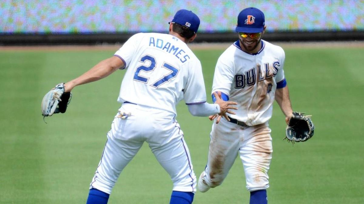 The Durham Bulls’ Willy Adames, left, and Johnny Field, right, face the RailRiders Tuesday in Game 1 of the Governor’s Cup.