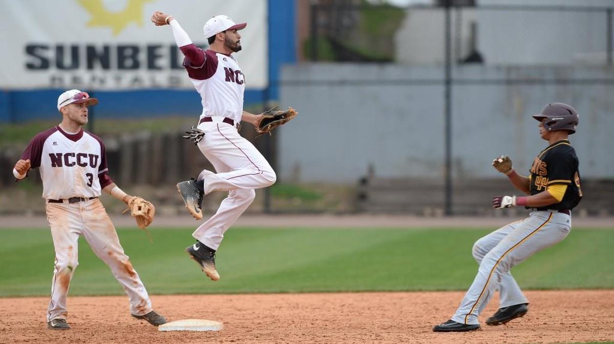 NCCU’s Thomas Prospero, center, tries to turn the double-play as Bethune-Cookman’s Josten Heron approaches second base.