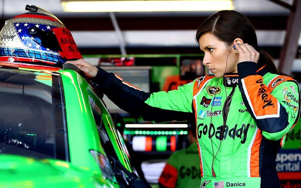 
Danica Patrick, driver of the #10 GoDaddy Chevrolet, stands in the garage area during practice for the NASCAR Sprint Cup Series GEICO 500 at Talladega Superspeedway on May 1, 2015 in Talladega, Alabama. 

