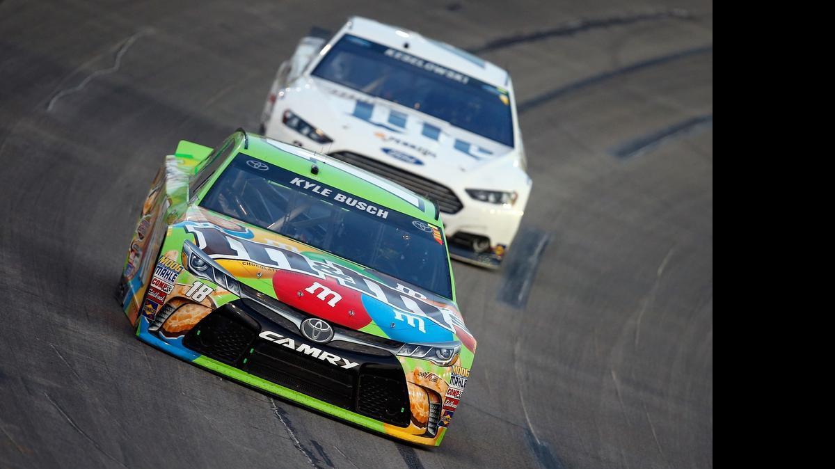 
Kyle Busch leads Brad Keselowski during the NASCAR Sprint Cup Series Quaker State 400 presented by Advance Auto Parts at Kentucky Speedway on July 11, 2015 in Sparta, Ky.
