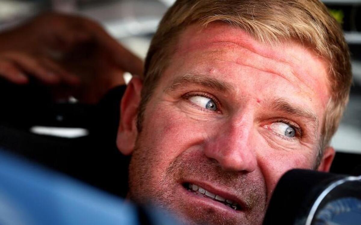 
Clint Bowyer, driver of the #15 5-hour Energy Toyota, sits in his car during practice for the NASCAR Sprint Cup Series Irwin Tools Night Race at Bristol Motor Speedway on August 21, 2015 in Bristol, Tennessee. 

