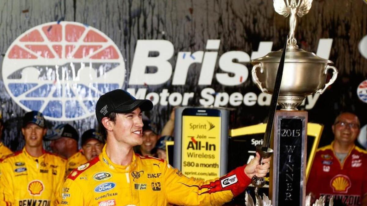 
Joey Logano holds a sword presented to him after winning Saturday night’s Irwin Tools Night Race at Bristol Motor Speedway Motor Speedway in Bristol, Tenn. 



