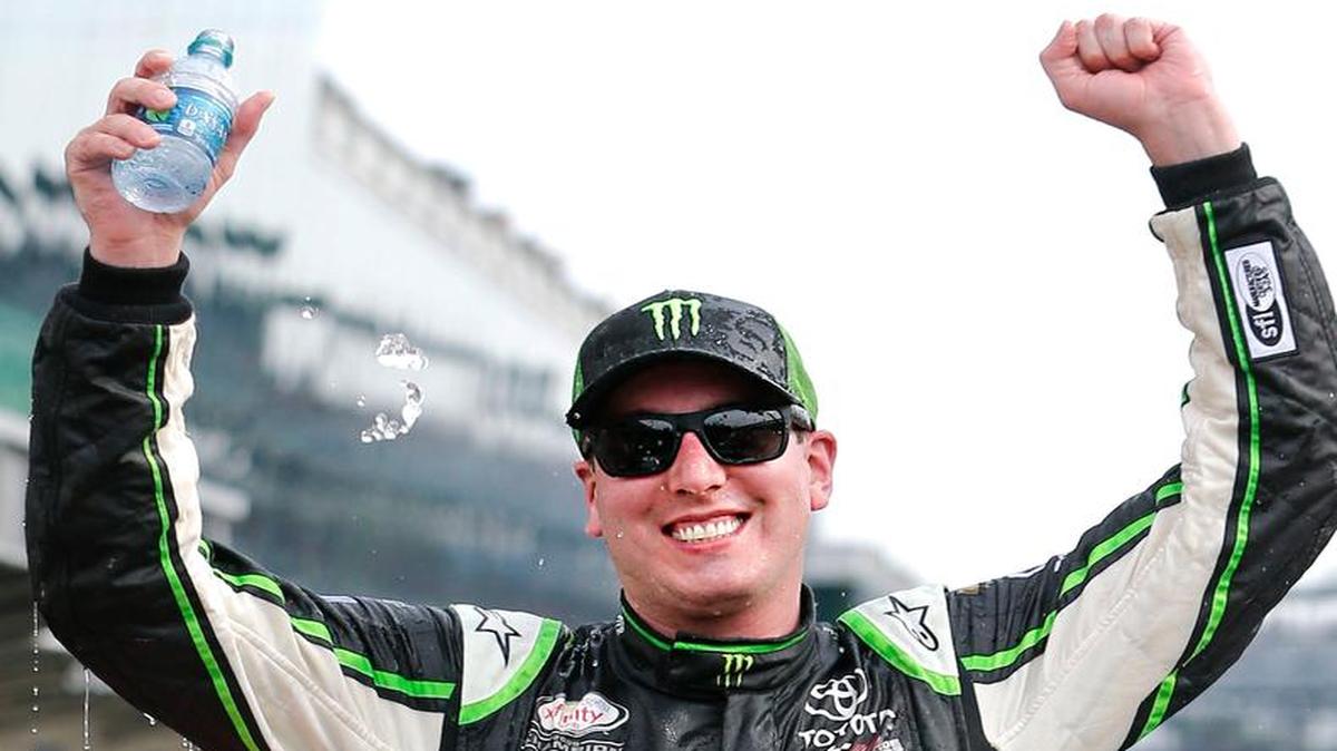 
Kyle Busch celebrates winning the NASCAR Xfinity Series auto race at Indianapolis Motor Speedway in Indianapolis, Saturday, July 25, 2015. (AP Photo/AJ Mast)
