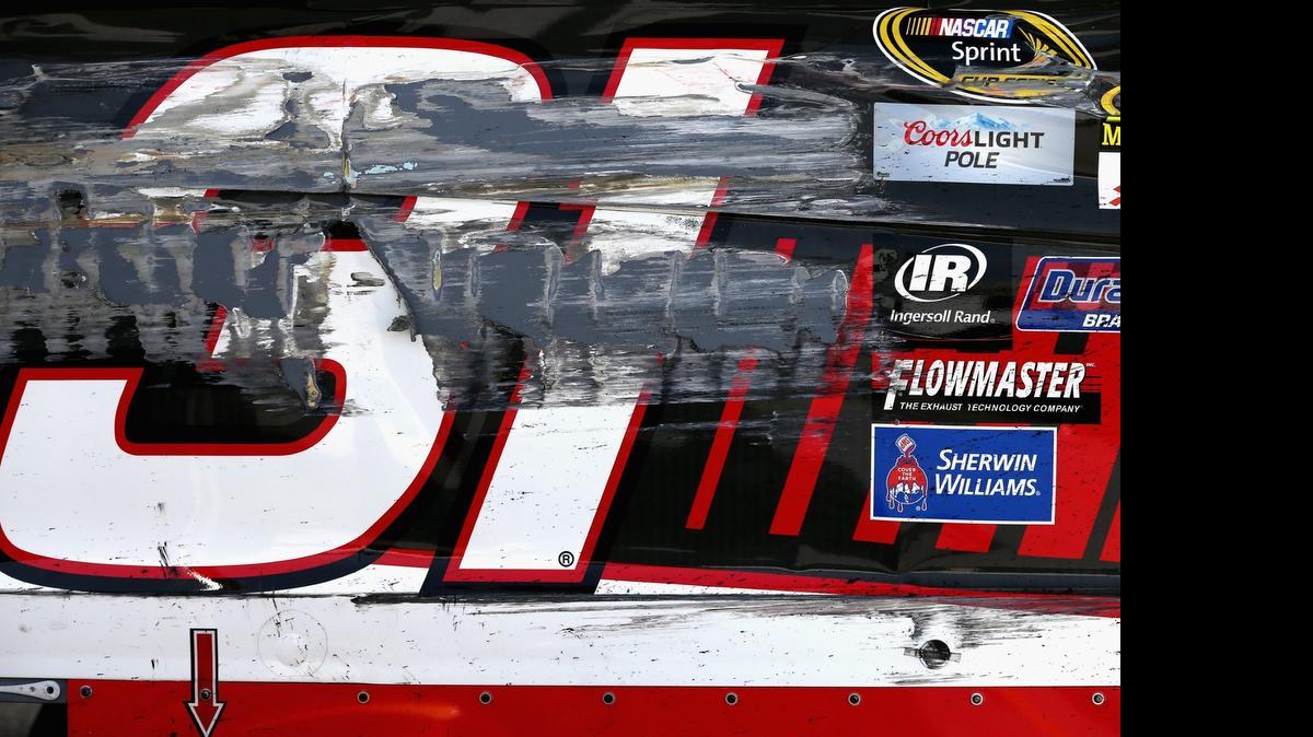 
Damage is seen on Ryan Newman’s Chevrolet following an incident during Friday’s practice for the NASCAR Sprint Cup Series Coke Zero 400 at Daytona International Speedway in Daytona Beach, Fla.


