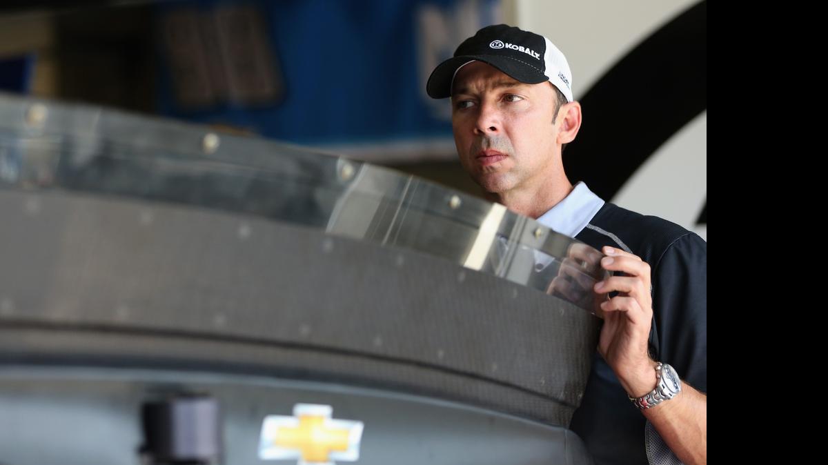 
Chad Knaus, crew chief of the No. 48 Chevrolet, inspects the rear spoiler during practice for the NASCAR Sprint Cup Series Crown Royal Presents the Jeff Kyle 400 at the Brickyard at Indianapolis Motorspeedway on Friday, July 24, 2015 in Indianapolis.
