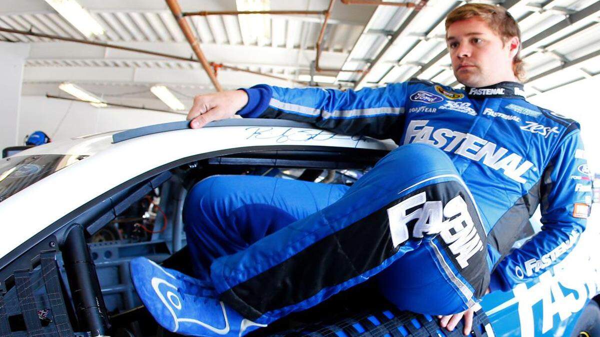 
Ricky Stenhouse Jr., driver of the #17 Fastenal Ford, climbs out of his car during practice for the 57th Annual Daytona 500 at Daytona International Speedway on February 14, 2015 in Daytona Beach, Florida. (Photo by Matt Sullivan/Getty Images)
