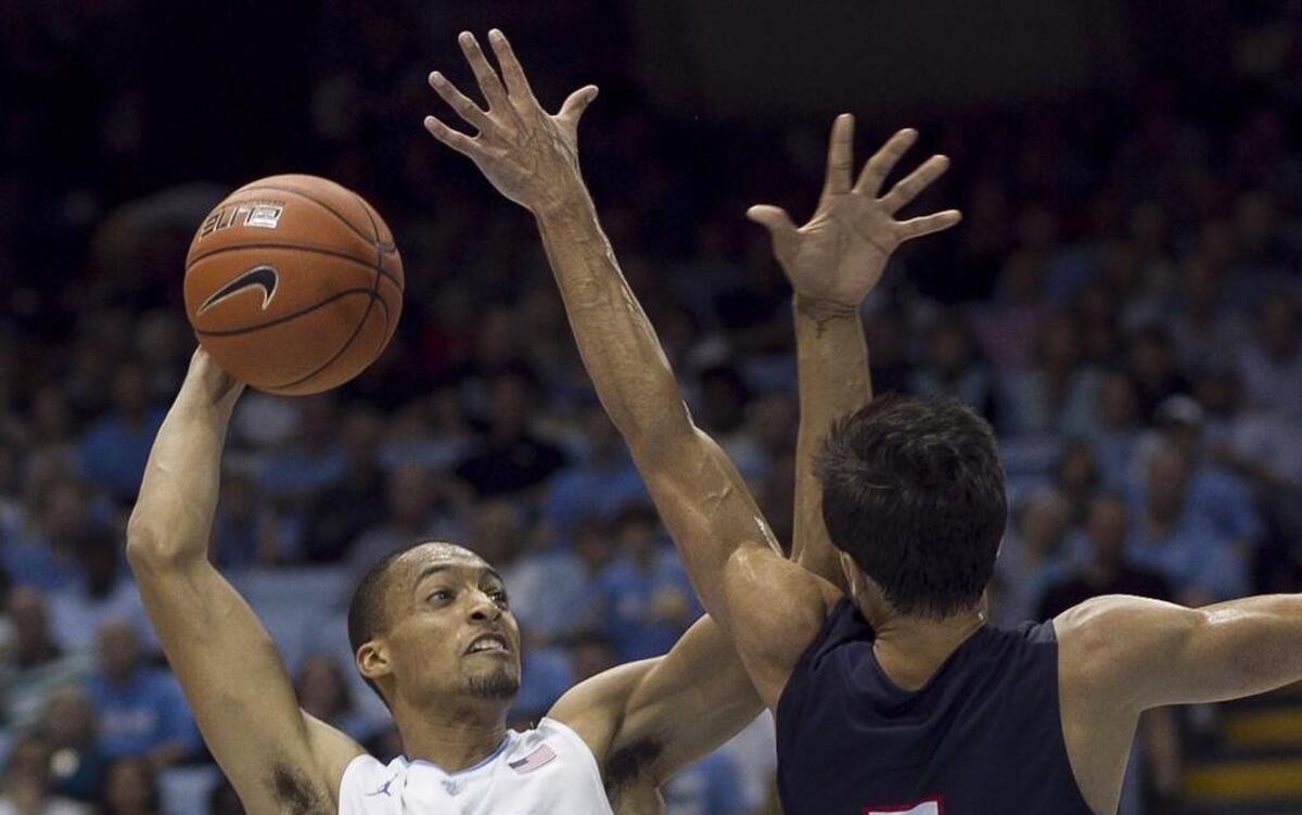 
J.P. Tokoto (13) gave up his remaining college eligibility to turn pro without much prospect of being chosen in the first round of the June 25 NBA draft.
