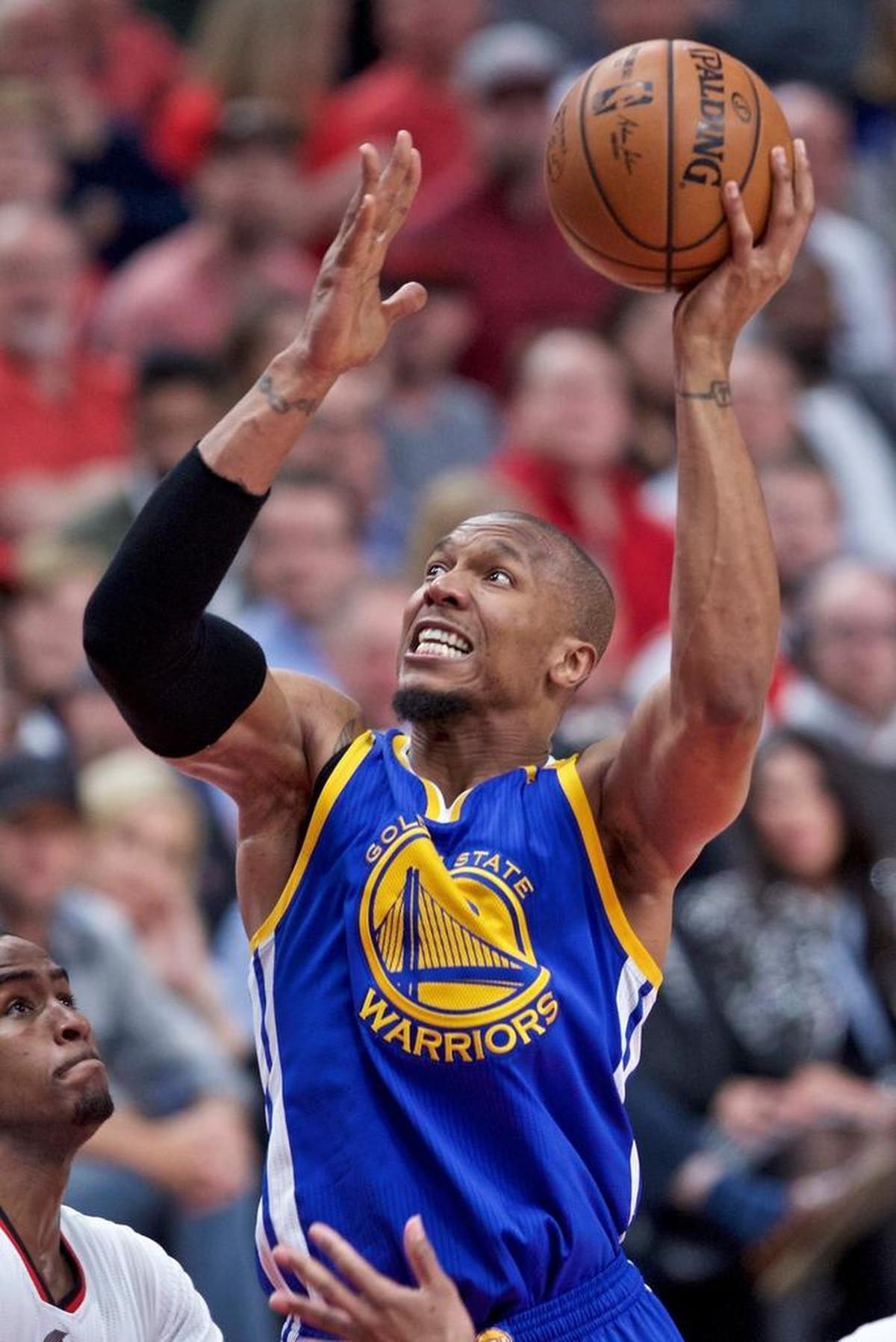 David West shoots over Portland forward Maurice Harkless in Game 3 of the first round of the NBA playoffs in April.