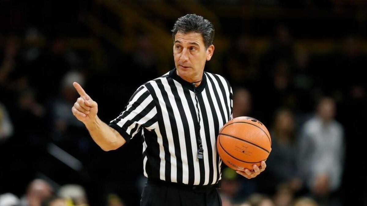 Gene Steratore officiates a basketball game between Iowa and Michigan on Jan. 2.