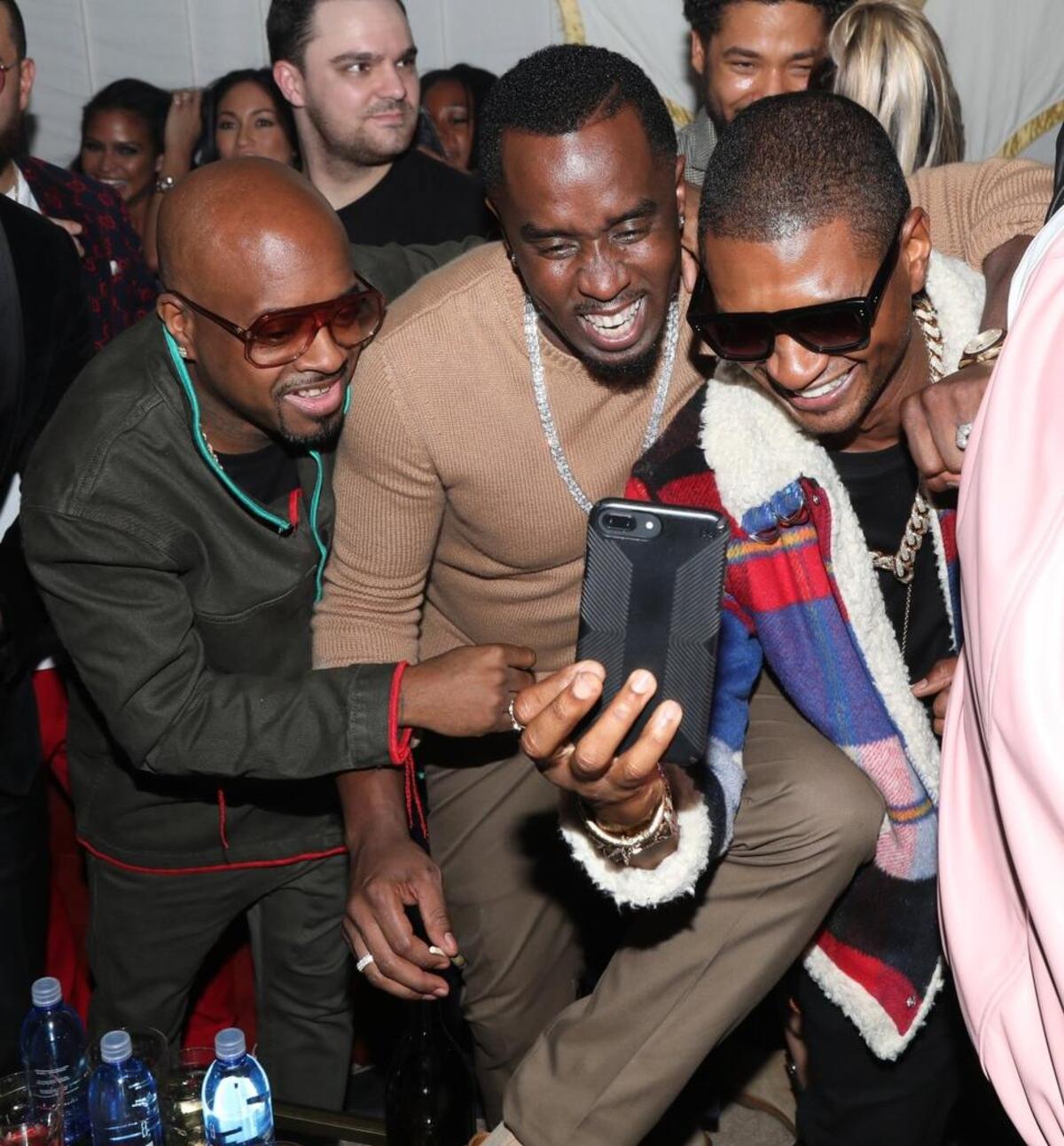 Jermaine Dupri, Sean “Diddy” Combs and Usher attend DJ Khaled’s Birthday Presented by COEROC and Fox on December 2, 2017 in Beverly Hills, California. Diddy has expressed interest in buying the Carolina Panthers team. Usher has been part of an investor group that owns the NBA’s Cleveland Cavaliers since 2005.