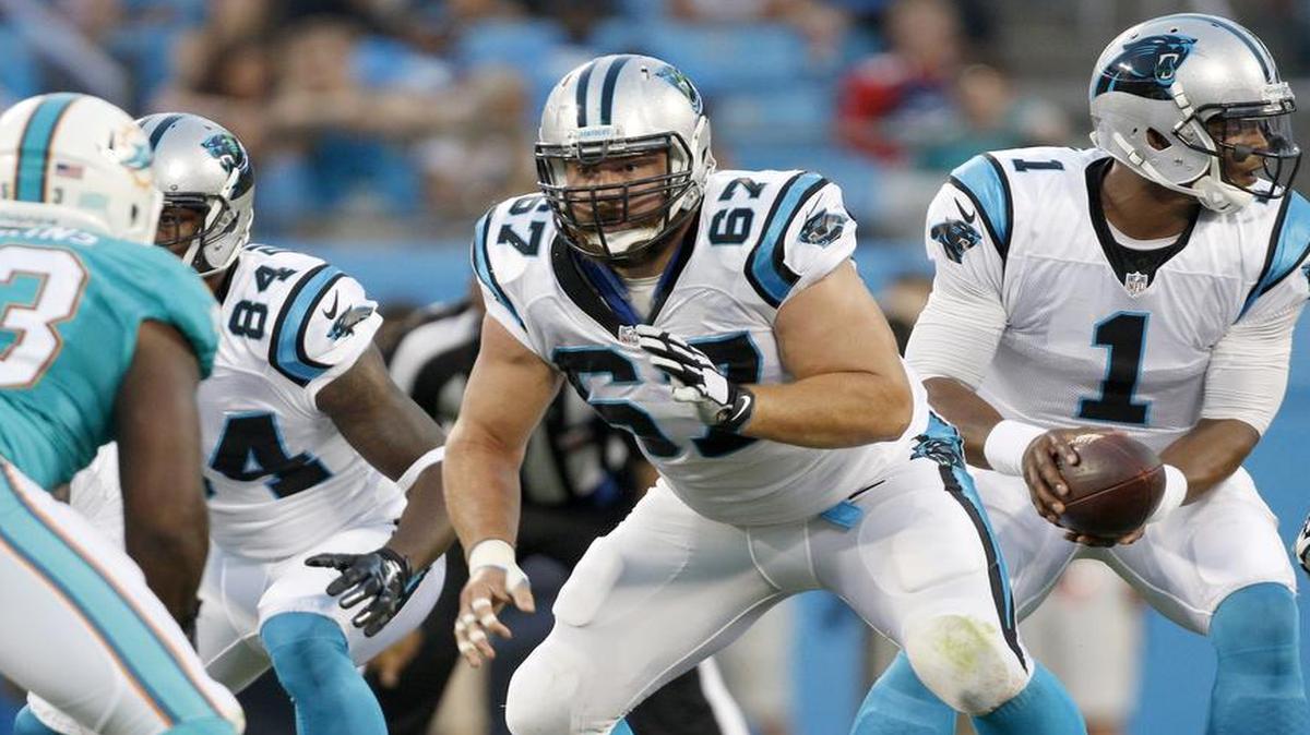 
Carolina Panthers center Ryan Kalil (67) prepares to block after he hiked the football to quarterback Cam Newton (1) against the Miami Dolphins during the first half of an NFL preseason football game Saturday. 
