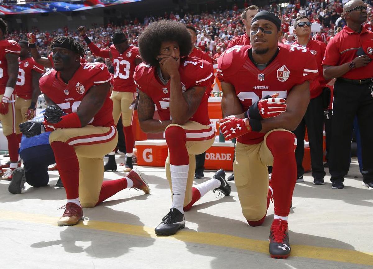 Eric Reid, right, became one of the most polarizing figures in the NFL in 2016, when he kneeled alongside Colin Kaepernick, center, in protest of police brutality and systemic oppression toward minorities in America.