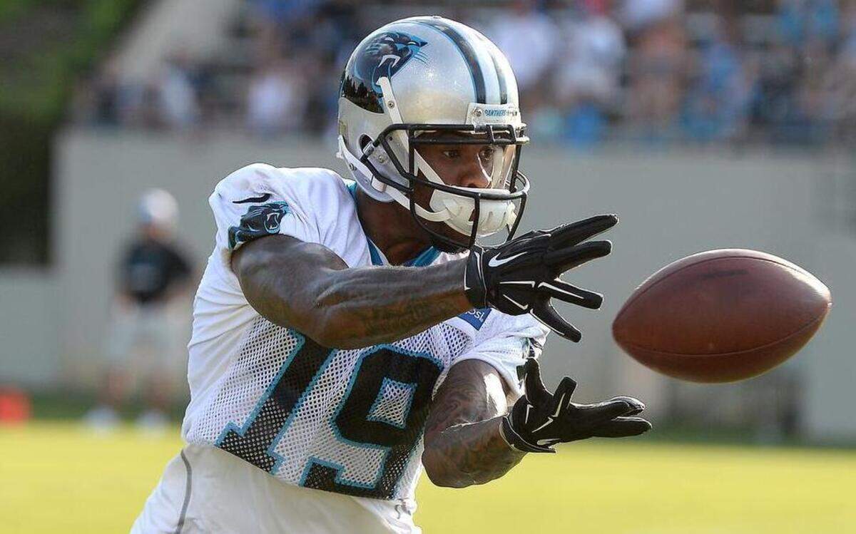 
Carolina Panthers wide receiver Ted Ginn Jr. left the Panthers for a payday in Arizona in 2014, but was happy to return. Here, he catches a pass during the team's first practice of training camp on Friday at Wofford College in Spartanburg.
