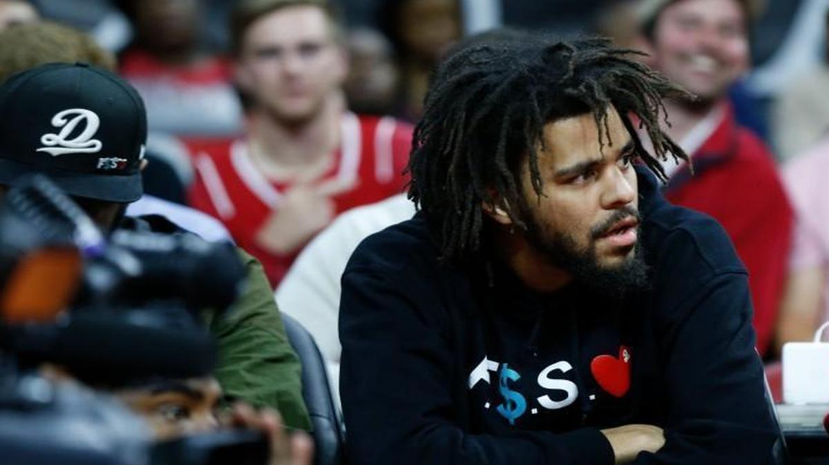 J. Cole watches during the second half of N.C. State's 81-79 victory over Georgia Southern at the PNC Arena in Raleigh, N.C., Friday, Nov. 11, 2016.