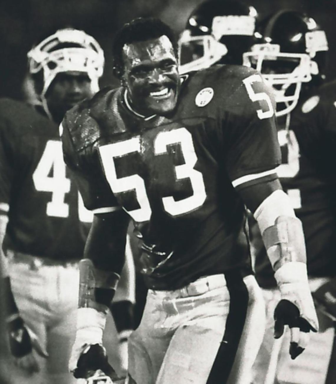 New York Giants' Harry Carson smiles after his teammates dumped a cooler of Gatorade over his head near the end of the teams 35-3 win over the Philadelphia Eagles at Giants Stadium in East Rutherford, N.J., in this Oct. 12, 1986 file photo.