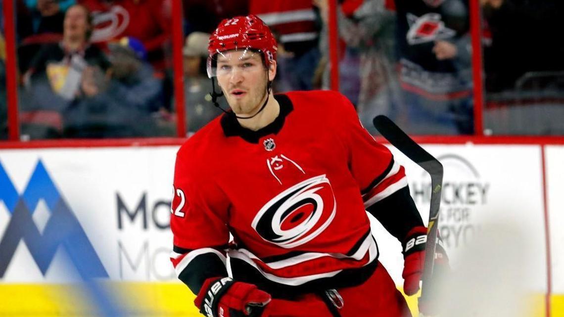 The Canes' Brett Pesce (22) celebrates after he scored during the first period of an NHL game played between the Carolina Hurricanes and the Vancouver Canucks at PNC Arena in Raleigh on Friday, Feb. 9, 2018.