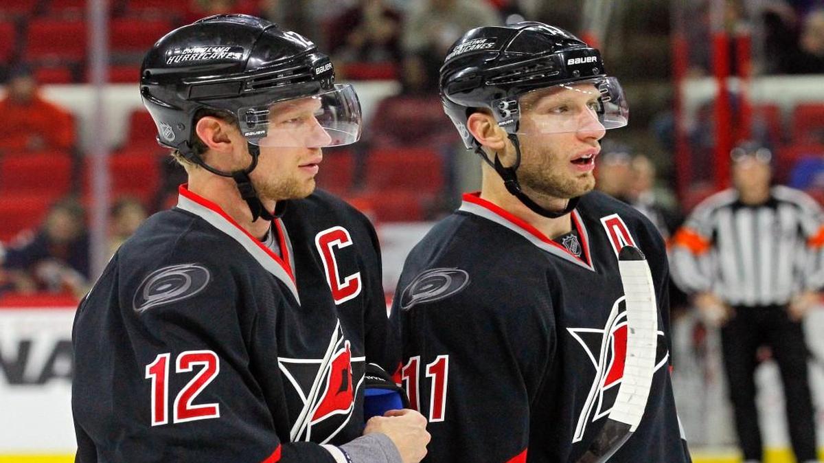 “Sometimes I’d look up and I’d see my younger brother waiting for a pass and in that brief second, I’d just have to pinch myself,” Eric Staal wrote in The Players’ Tribune, a personal thank-you note to the Carolina Hurricanes organization and Hurricanes fans. Here, Eric Staal (12) confers with his brother Jordan Staal (11) during a game with the New York Islanders at PNC Arena in Raleigh on Feb. 17, 2015.