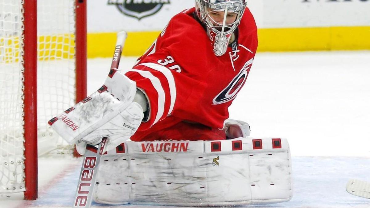 The Carolina Hurricanes' Cam Ward (30) defends a shot during agame played against the Boston Bruins at PNC Arena in Raleigh, N.C. on Feb. 26, 2016.