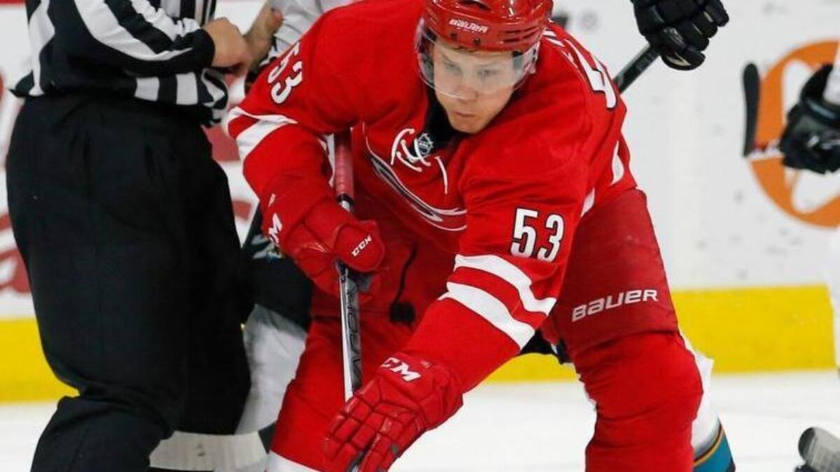 The Carolina Hurricanes' Jeff Skinner (53) faces off against the San Jose Sharks' Joel Ward (42) during the second period of an NHL game played between the Carolina Hurricanes and the San Jose Sharks at PNC Arena Feb. 19.